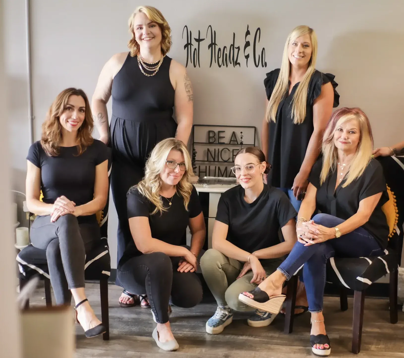 group photo of hot headz salon staff